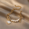 Golden Muse Pearl Charm Bracelet